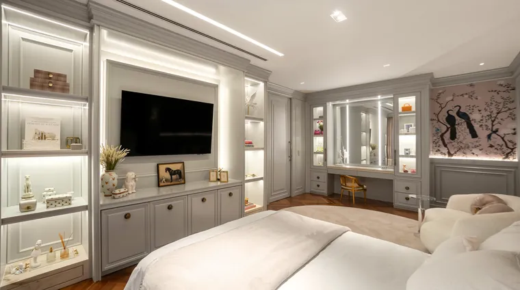 Painel de TV e nichos iluminados na suíte